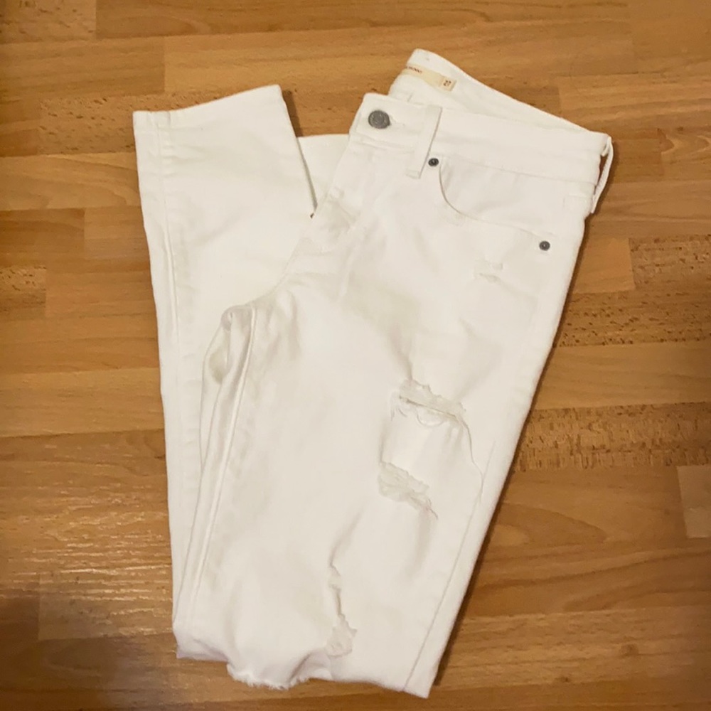 Levi’s 711 distressed white skinny jeans